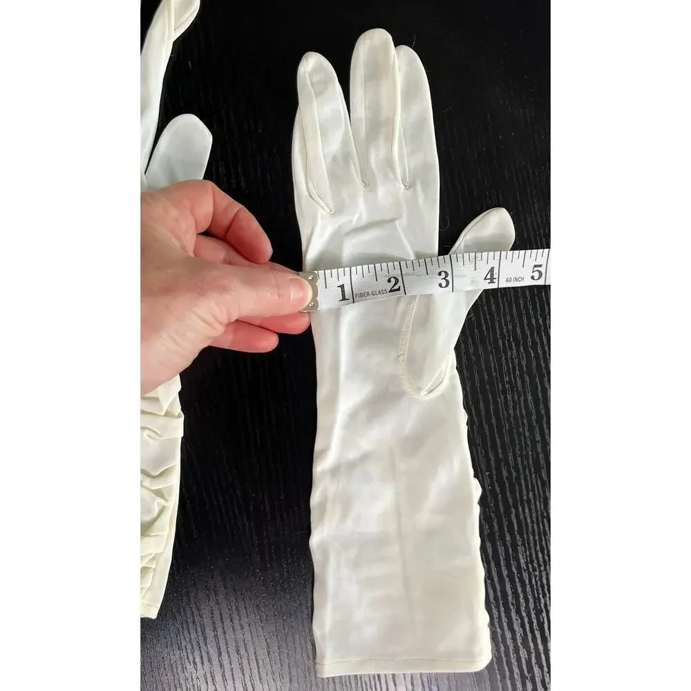 Vintage 60's era elegant long dress gloves tagged with faux pearl accents